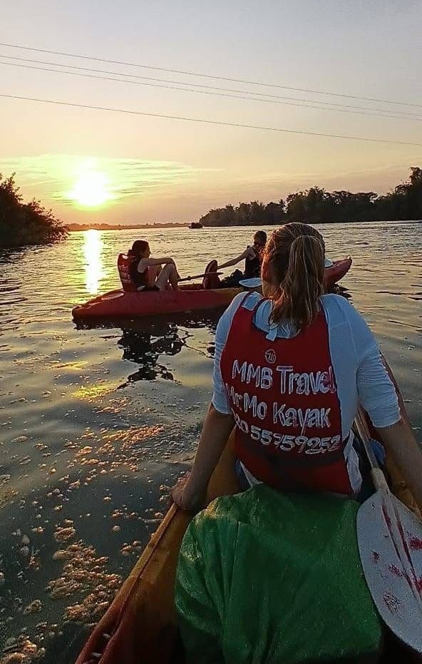 Kayak passing small islets